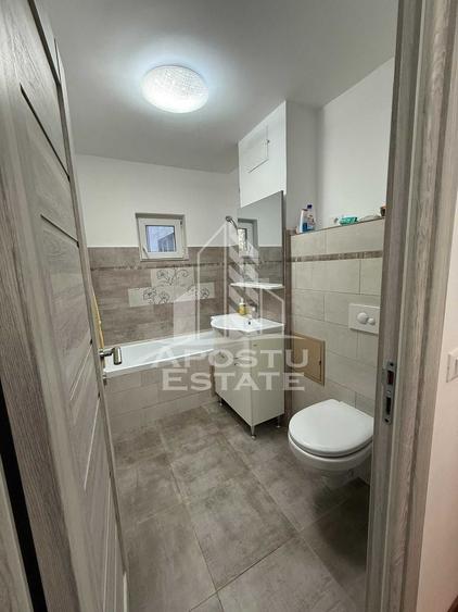 Apartament cu 3 camere semidecomandat, mobilat în Bucovina