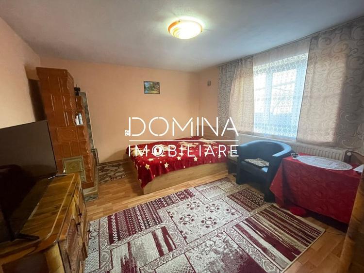 Casă individuală cu 7 camere cu Canalizare în Drăguțești