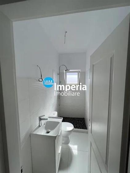 Casă individuală cu 4 camere cu Teren 500 Mp în Bucium