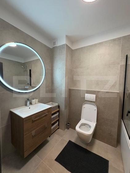 Apartament cu 2 camere semidecomandat, mobilat în Central
