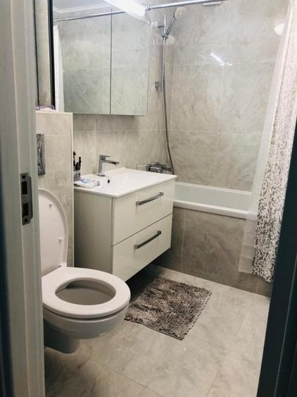 Apartament cu 3 camere decomandat, mobilat în Faleza Nord