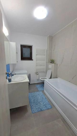 Apartament cu 2 camere decomandat în Tractorul