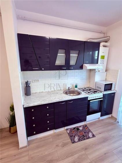 Apartament cu 2 camere semidecomandat, mobilat în Aradului