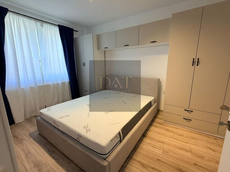 Apartament cu 2 camere semidecomandat în Chinteni