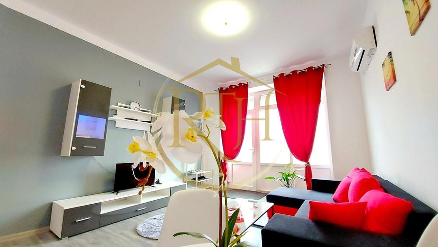 Apartament cu 2 camere semidecomandat, mobilat în Central