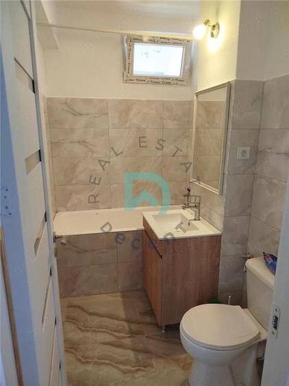 Apartament cu 3 camere decomandat în Tractorul