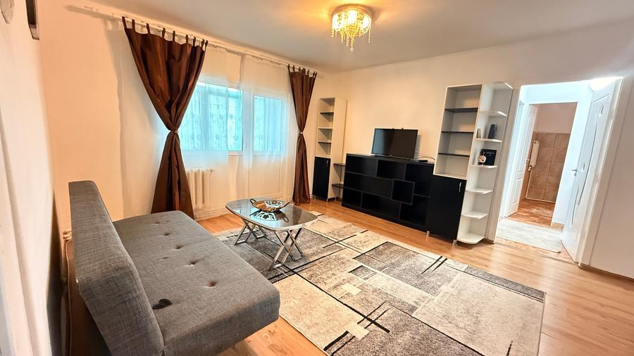 Apartament cu 2 camere semidecomandat, mobilat în Central
