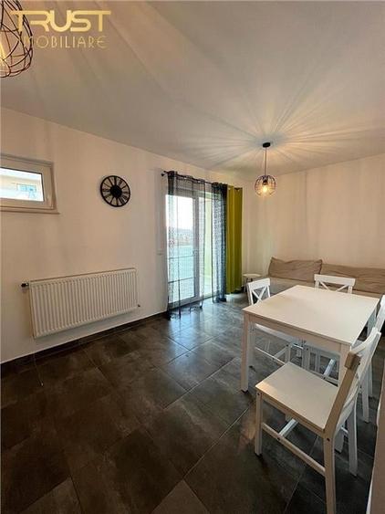 Apartament cu 3 camere decomandat în Sud