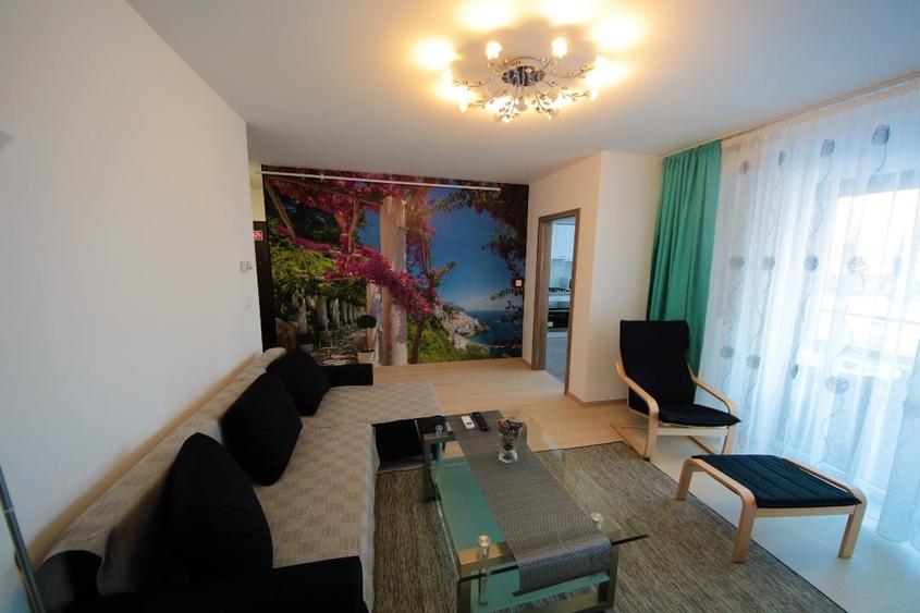 Apartament cu 2 camere semidecomandat, mobilat în Aradului