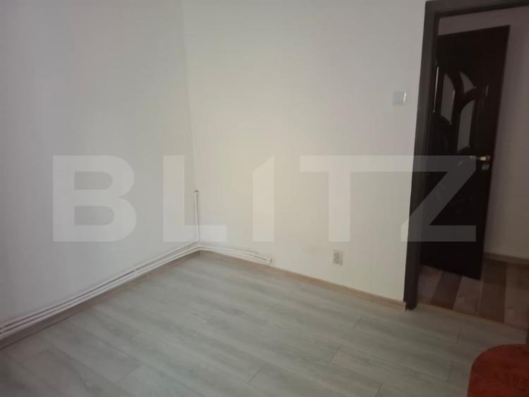 Apartament cu 2 camere semidecomandat, mobilat în Titu