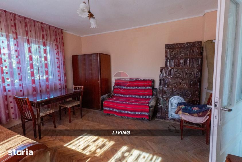 Casă cu 2 camere cu Teren 1300 Mp în Copalnic