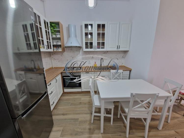 Apartament cu 3 camere semidecomandat, mobilat în Central