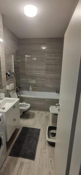 Apartament cu 3 camere semidecomandat, mobilat în Exterior Nord