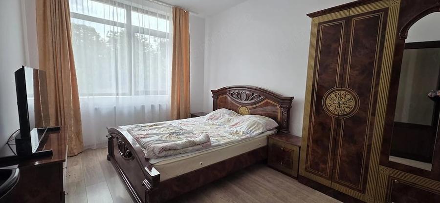 Casă cu Teren 120 Mp în Est