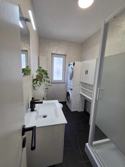 Apartament cu 2 camere semidecomandat în Chinteni