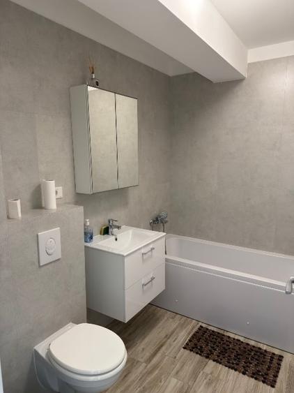 Apartament cu 2 camere semidecomandat, mobilat în Central