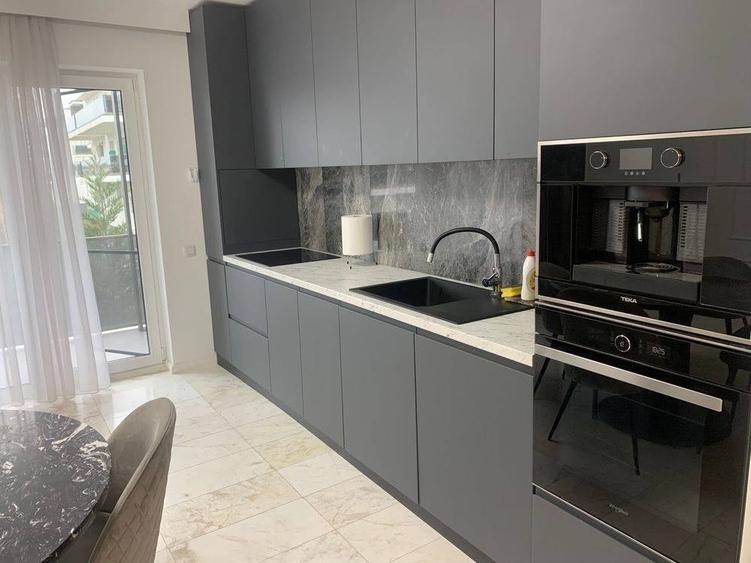 Apartament nou cu 2 camere, confort sporit, 60mp, etaj 1, superfinisat, mobillat si utilat, cu garaj - 2