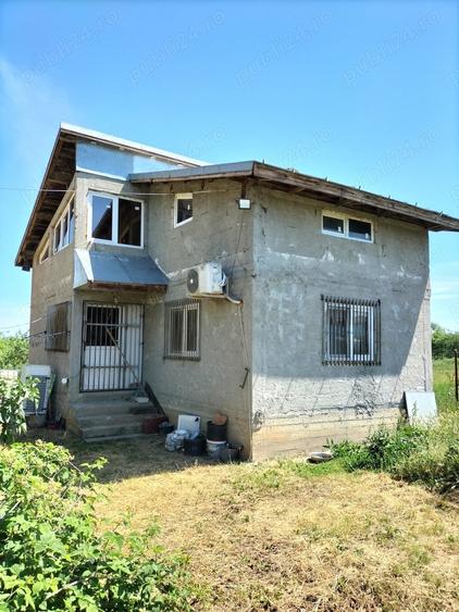 Casă cu 4 camere în Dragomirești-Deal