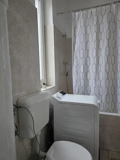 Apartament cu 2 camere semidecomandat, mobilat în Regie