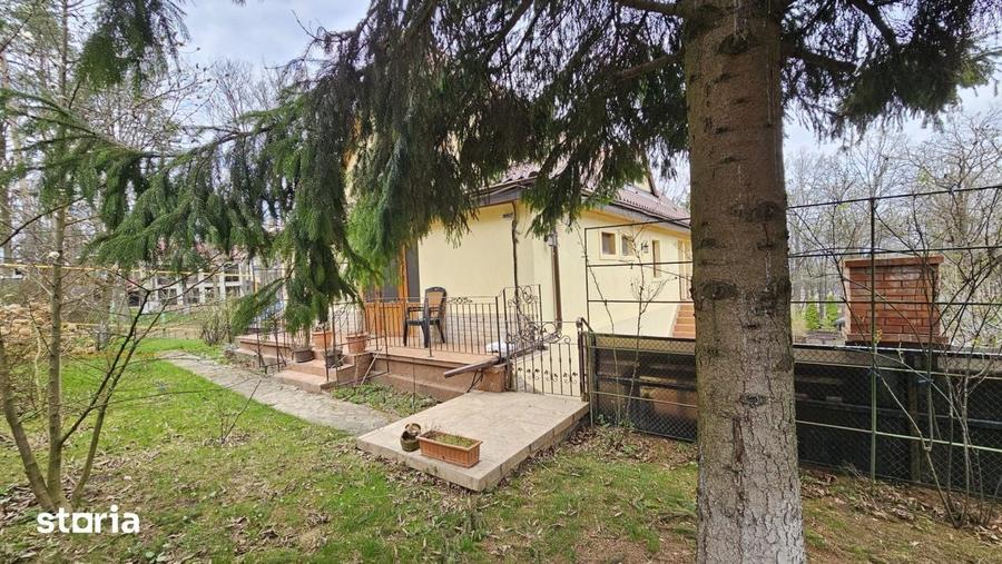 Casă cu 5 camere cu Teren 950 Mp în Bucium
