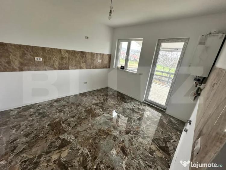 Casă cu 4 camere cu Teren 570 Mp în Tomești