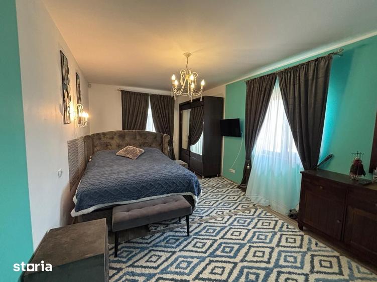 Casă cu 5 camere cu Teren 1000 Mp în Șcheia