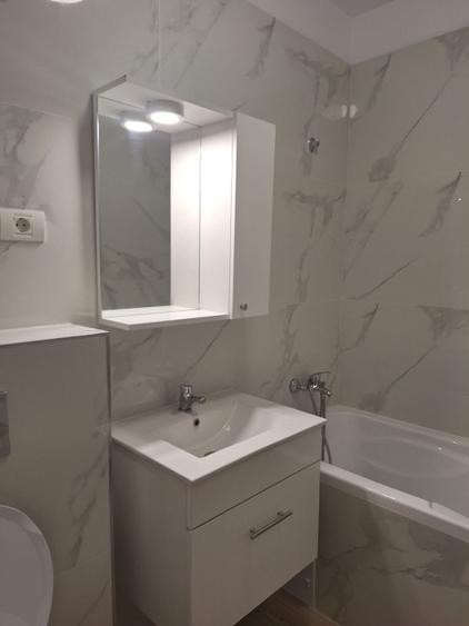 Apartament cu 2 camere semidecomandat, mobilat în Central