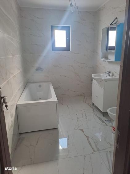 Casă cu 4 camere cu Teren 400 Mp în Central