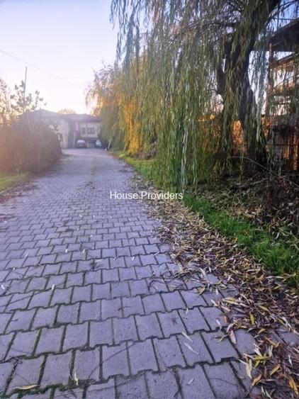 Casă individuală cu 5 camere cu Canalizare în 1 Decembrie