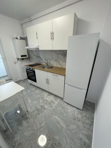 Garsoniera in bloc nou - 6