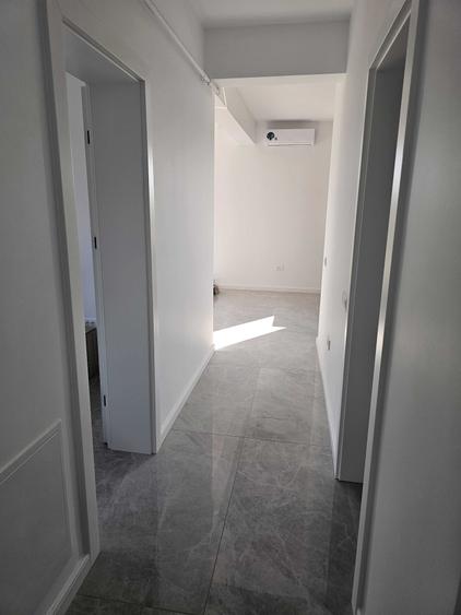 Apartament cu 2 camere decomandat în Sânmartin