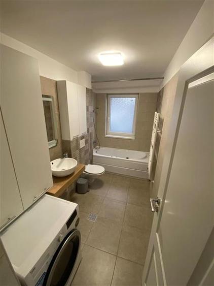Apartament cu 2 camere decomandat, mobilat în Tractorul