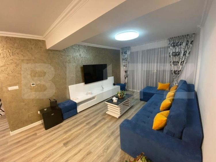 Apartament cu 3 camere semidecomandat, mobilat în Calea București