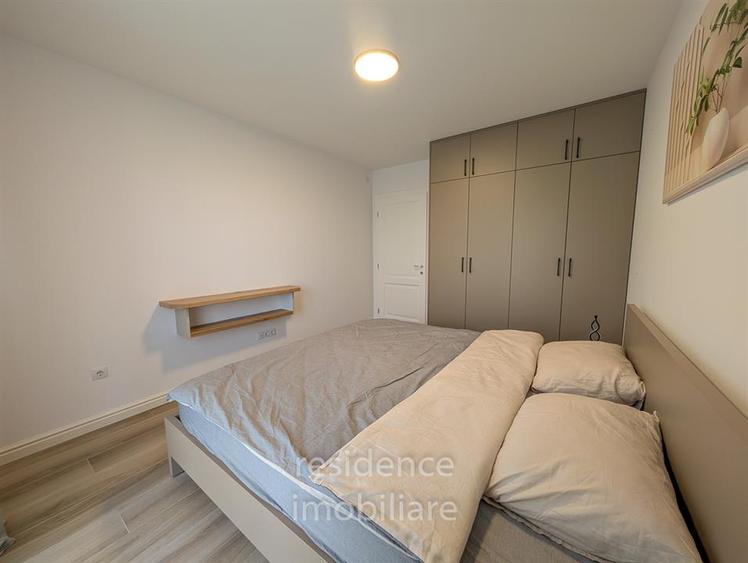 Apartament cu 4 camere semidecomandat, mobilat în Borhanci
