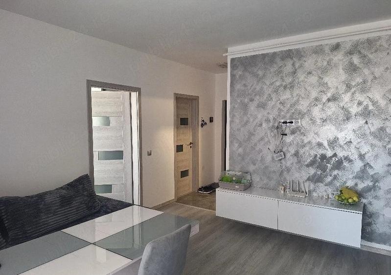 Apartament cu 2 camere semidecomandat, mobilat în Chinteni