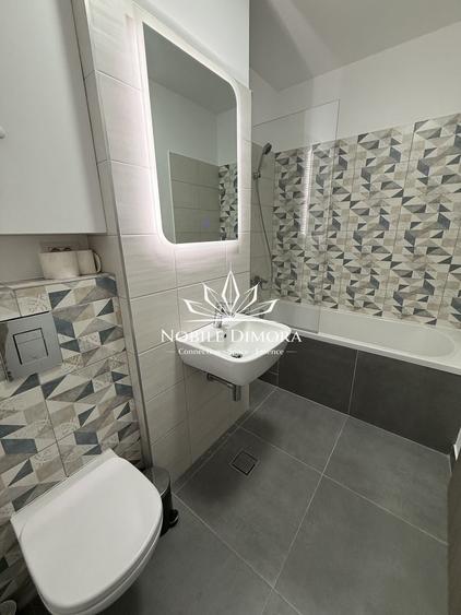Apartament cu 2 camere semidecomandat, mobilat în Take Ionescu