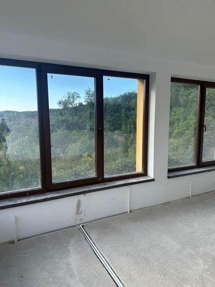 Casă cu 4 camere în Cotmeana