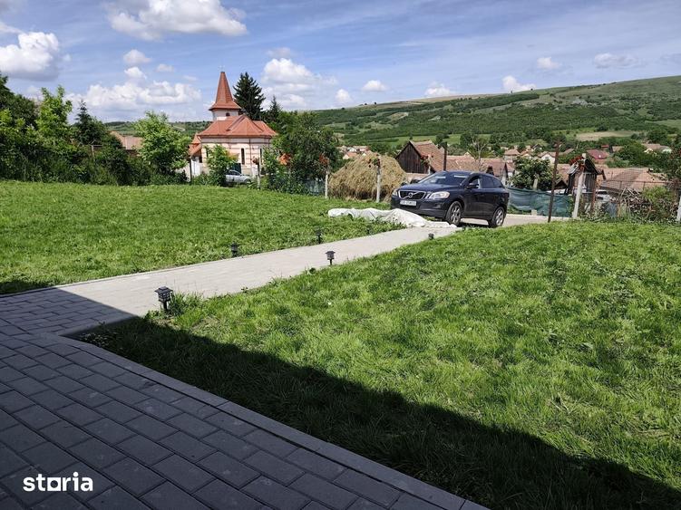 Casă cu 2 camere decomandat cu Teren 606 Mp în Slimnic