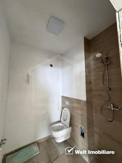 Apartament cu 3 camere semidecomandat, mobilat în Borhanci