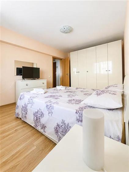 Apartament cu 2 camere decomandat în Tractorul