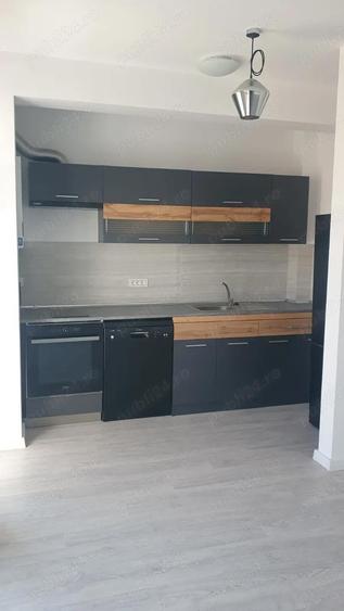 Apartament 2 camere cu bucatarie mobilata, terasa 40 mp,loc de parcare privat - 4