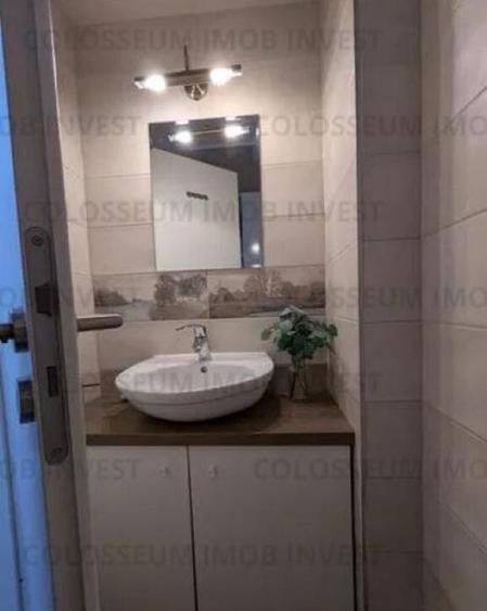 Apartament cu 3 camere, decomandat - zona Tractorul - 1