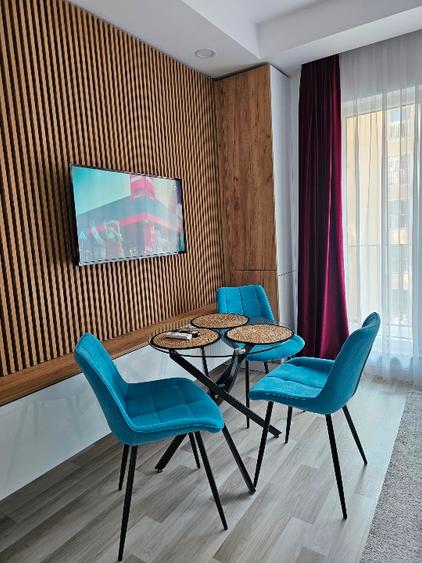 Ofer spre închiriere apartament două camere Cosmopolis  - 1