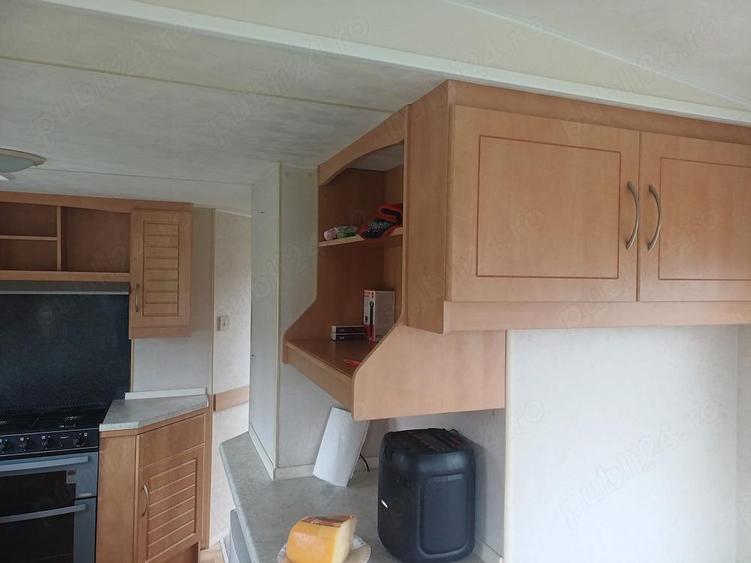 De vanzare casa pe roti , 3 dormitoare , 2 bai, living si bucatarie, mobilat utilat , pre? 21800 E - 9