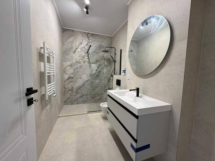 Apartament nou cu 2 camere, 56mp, etaj 1, finisat modern, cu garaj sub bloc - 1