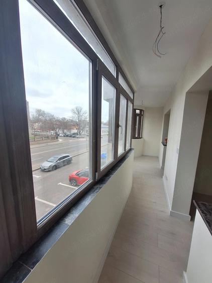 3 camere decomandate Baia Comunala etajul 1 - 8