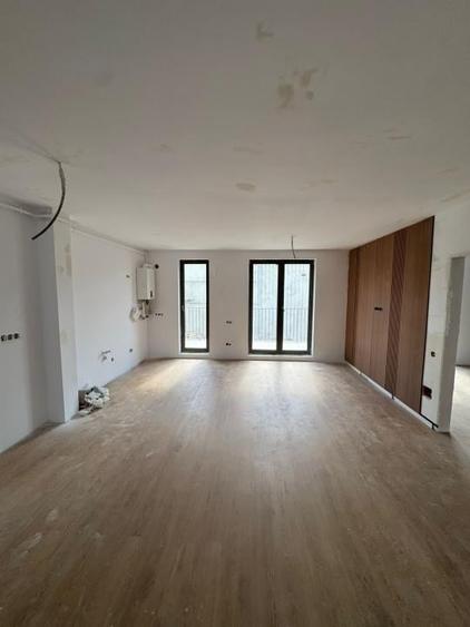 Apartament cu 2 camere finisat, 53 mp, balcon, zona Eroilor - 1