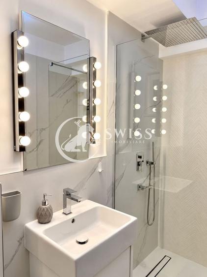 Apartament cu 2 camere semidecomandat, mobilat în Central
