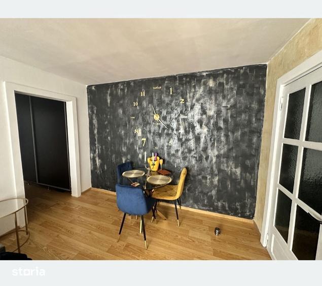 Apartament cu 3 camere semidecomandat în Calea București