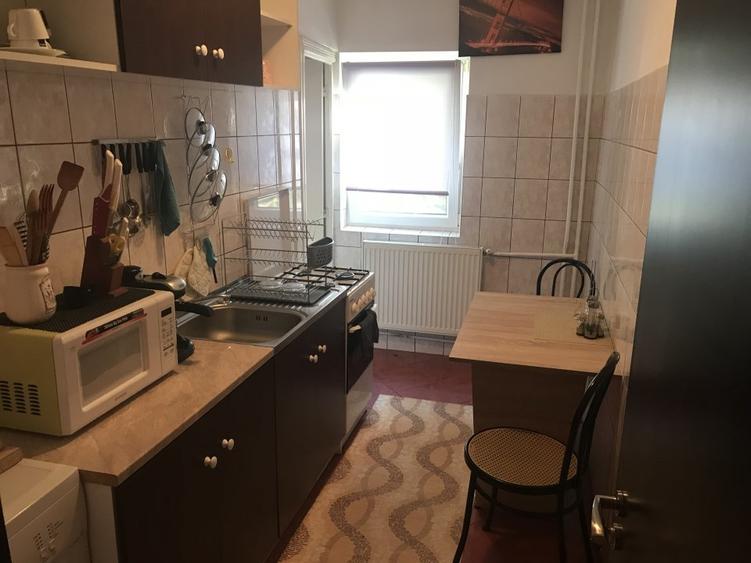 APARTAMENT O CAMERA DECOAMNDAT centrala proprie - 13